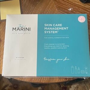 Jan Marini Skin Care Management System - Teal and White